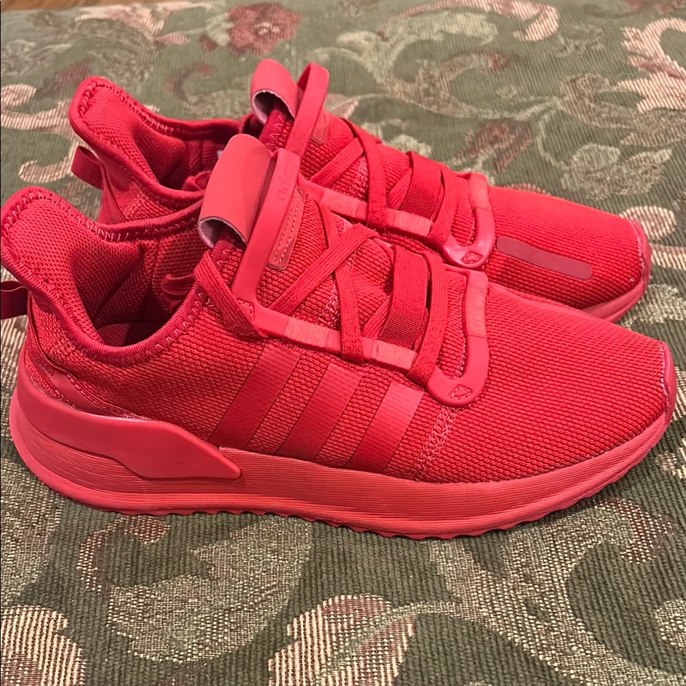 Adidas U_Path Run sneaker in a vibrant scarlet red color.